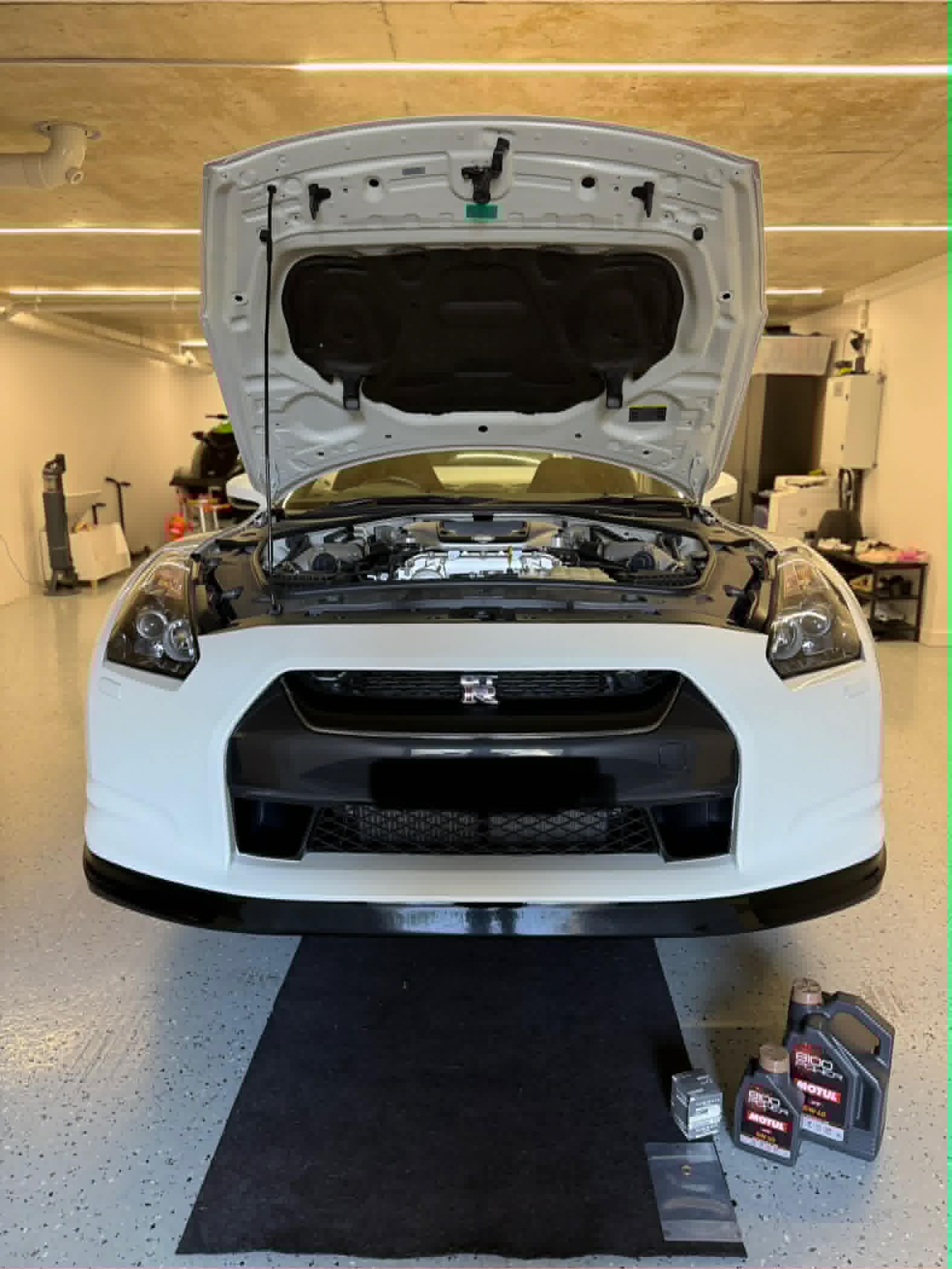 Nissan R35 GT-R oil service using Motul 8100 by On The Go Garage mobile mechanic